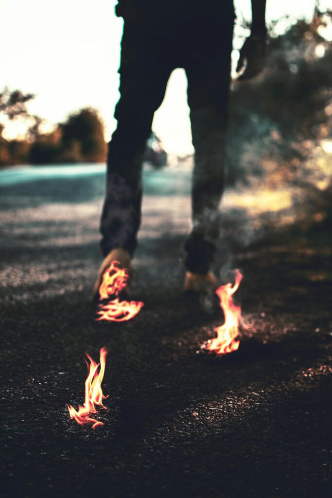 Person Walking on Fire