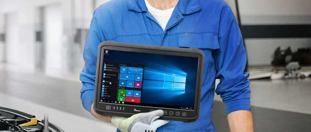 Auto technician using onboard diagnostics to check engine light causes and perform a detailed car diagnostic test.